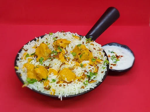 Old Delhi Butter Chicken Biryani (Boneless) With FREE COKE