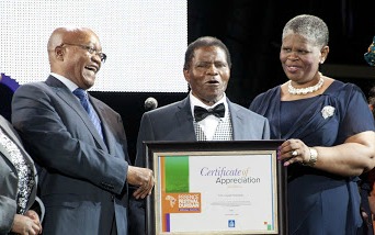 Former president Jacob Zuma and eThekwini mayor Zandile Gumede honour Ladysmith Black Mambazo’s retired lead Joseph Shabalala with a certificate of appreciation during the Essence Festival All Star music concert in November 2016.