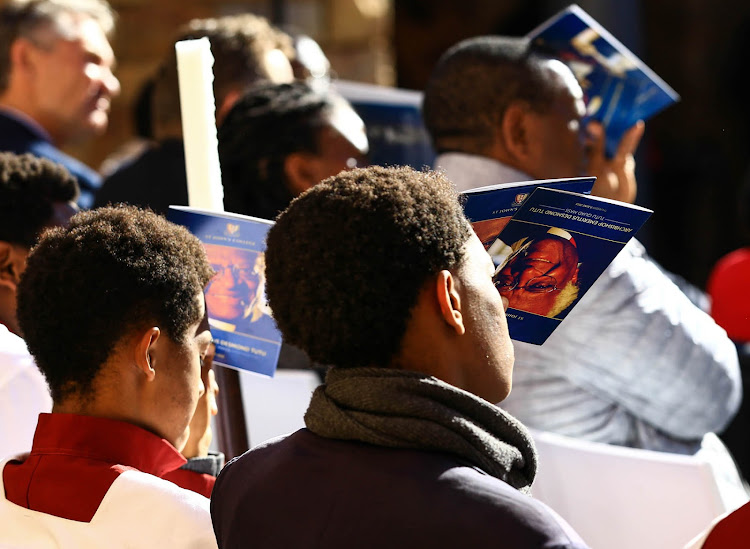 Pupils attend a naming ceremony in honour of Anglican cleric and human rights campaigner Desmond Tutu.