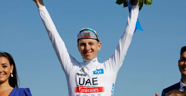 UAE Team Emirates' Tadej Pogacar celebrates on the podium wearing the white jersey after stage 9 at the Saint-Leonard-De-Noblat to Puy De Dome in France on July 9 2023. Picture: STEPHANE MAHE/REUTERS