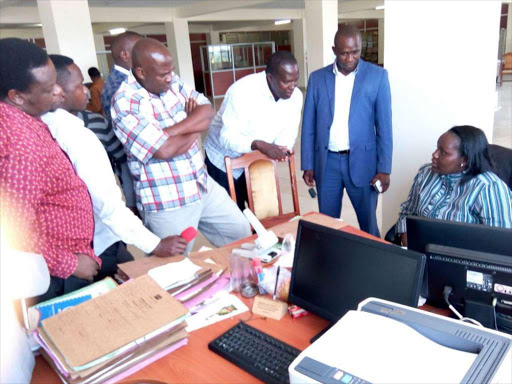 WE WANT ANSWERS: Machakos residents at the Office of the Director of Public Prosecutions in Machakos yesterday. They want Governor Alfred Mutua arrested.