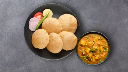 5 Luchi With Aloo Matar Sabzi