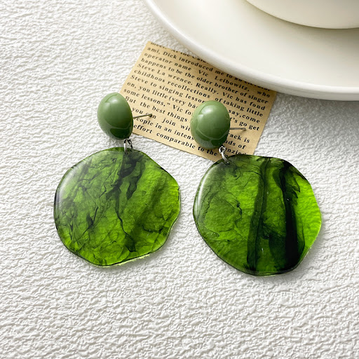 Title 3, Dark green smoke round resin earrings, a stylis...