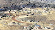 NOT IN MY BACKYARD: An RDP housing project is mushrooming in Inanda, near Durban, much to the annoyance of the nearby residents.