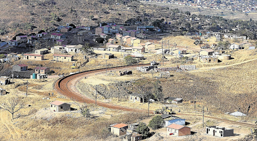 NOT IN MY BACKYARD: An RDP housing project is mushrooming in Inanda, near Durban, much to the annoyance of the nearby residents.