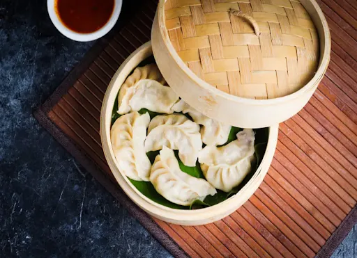 Chicken Momos In Hot Garlic Sauce