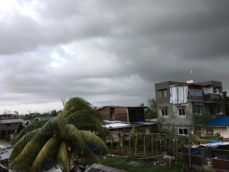 allen trees and buildings are seen after Typhoon Phanfone swept through Tanauan, Leyte, in the Philippines December 25, 2019, in this photo obtained from social media.