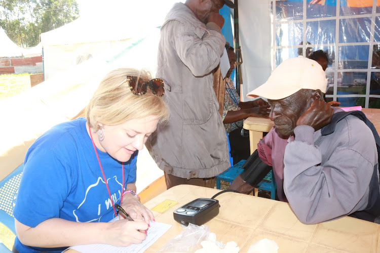 A medic attends to Richard Wabwile from Chetambe at Compel Outreach Centre in Nangoto, Webuye town, on Saturday