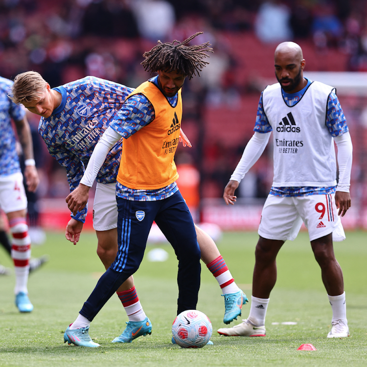 Arsenal's Martin Odegaard, Mohamed Elneny and Alexandre Lacazette during a warm up session