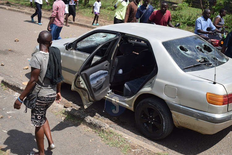 A car destroyed by protesters during a protest in Homa Bay on March 20, 2023.