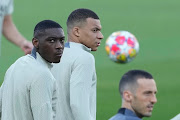 Paris St-Germain strikers Kylian Mbappe and Randal Kolo Muani during a training session at Barcelona's Lluis Companys Olympic Stadium facility on Monday. 