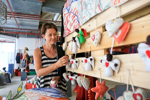 CRAFTY CHRISTMAS: Product development consultant Marika Jacobs says the quality crafts for sale at the pop-up craft shop in Vincent Park were sourced from many corners of the Eastern Cape and offer Christmas shoppers a range of artistic creations. The shop is up until December 18 Picture: STEPHANIE LLOYD