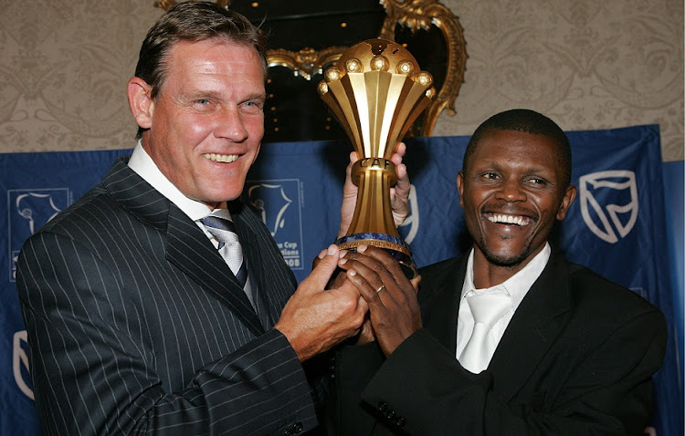 Bafana Bafana's 1996 Africa Cup of Nations-winning captain Neil Tovey and ex-midfielder John Moeti with the Nations Trophy during an Afcon trophy tour cocktail function at the Westcliff Hotel in Johannesburg in 2007.