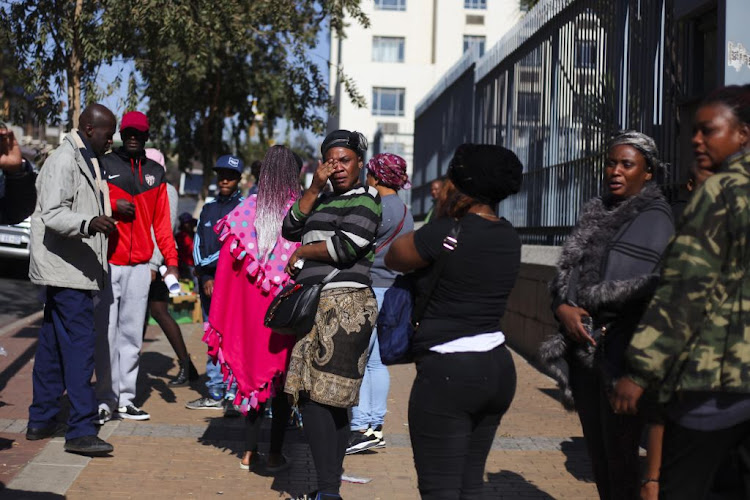 Family members of a Forest High School pupil who was stabbed to death are emotional as they leave the Johannesburg Magistrate's Court where his attacker made a first appearance on June 5 2019.