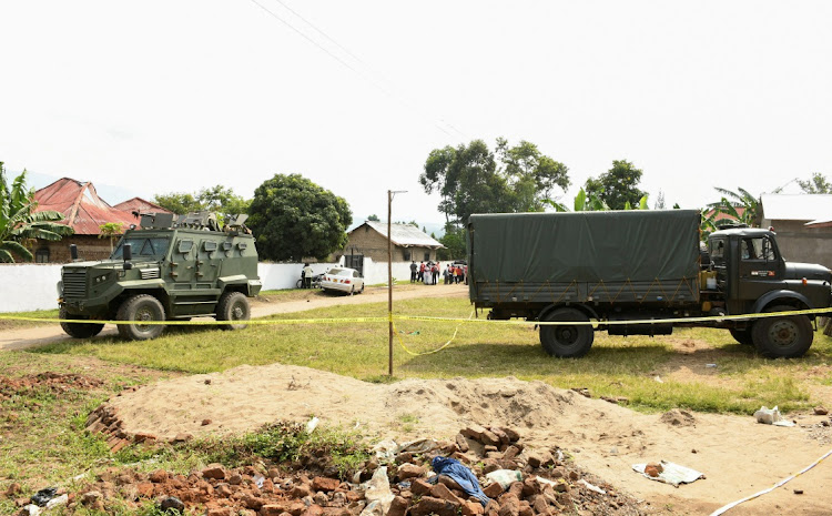 Ugandan security forces cordon the scene outside the Mpondwe Lhubirira Secondary School, after militants killed and abducted multiple people in Mpondwe, western Uganda, on June 17 2023. File photo: REUTERS