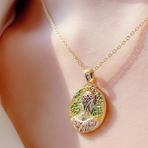Title 6, Embossed portrait enamel drip glazed green earr...