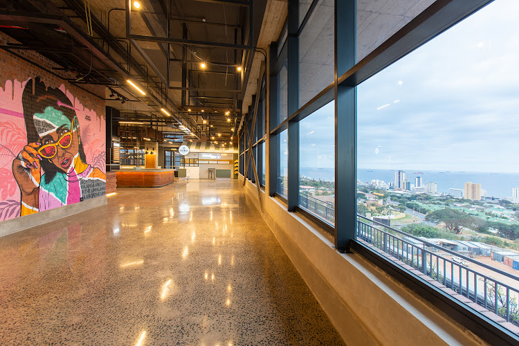 The building has an industrial feel and graffiti art.