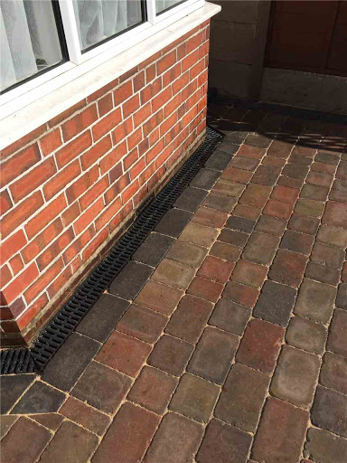 Cobbles with aco channel drains