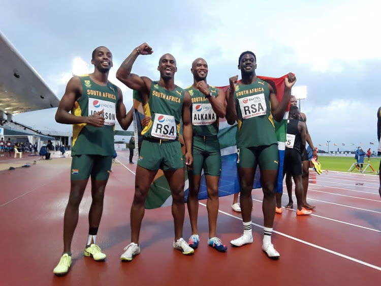 Cheswill Johnson, Henricho Bruintjies, Antonio Alkana and Benji Richardson show their delight after taking silver in the men's 4x100m relay at the African championships in Mauritius on Friday.