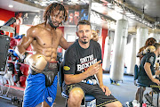 Newly crowned IBF Continental Africa junior welterweight champion Marios Matamba and trainer Sean Smith. /Supplied