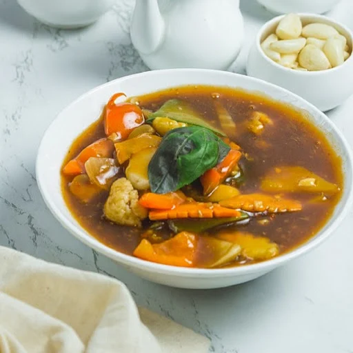 Schezwan Mixed Vegetable With Baby Corn And Button Mushroom