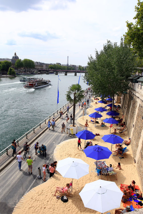 Parts of the banks of the Seine are transformed into beaches in the summer months.