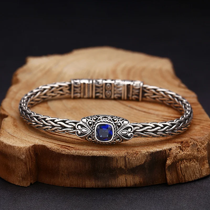 Bracelet en argent sterling 925 tressé à la main avec zircon bleu, bijou élégant. Un accessoire raffiné pour sublimer votre poignet.