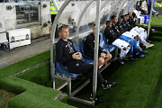 Milutin 'Micho' Sredojevic with players watch on during a Caf Champins League match. 