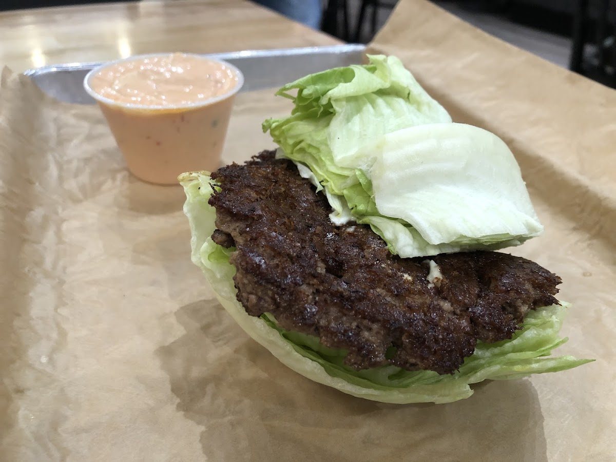 1/4 lb angus burger with MOOYAH sauce on the side.