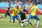 Luvuyo Memela of Orlando Pirates and Oupa Manyisa of Mamelodi Sundowns during the Absa Premiership match between Mamelodi Sundowns and Orlando Pirates at Loftus Versfeld Stadium on January 13, 2018 in Pretoria, South Africa. 