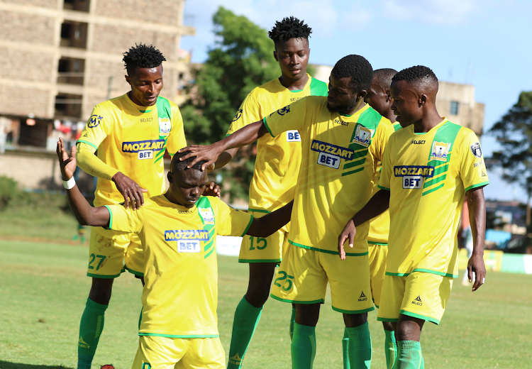 Kakamega Homeboyz players celebrate with David Odhiambo after scoring against Kariobangi sharks in a past match