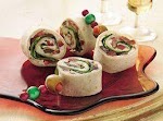 Greek Salad Pinwheels was pinched from <a href="http://www.tablespoon.com/recipes/greek-salad-pinwheels/b6c6a9cc-7123-4dc5-955a-0072c66690c4" target="_blank">www.tablespoon.com.</a>