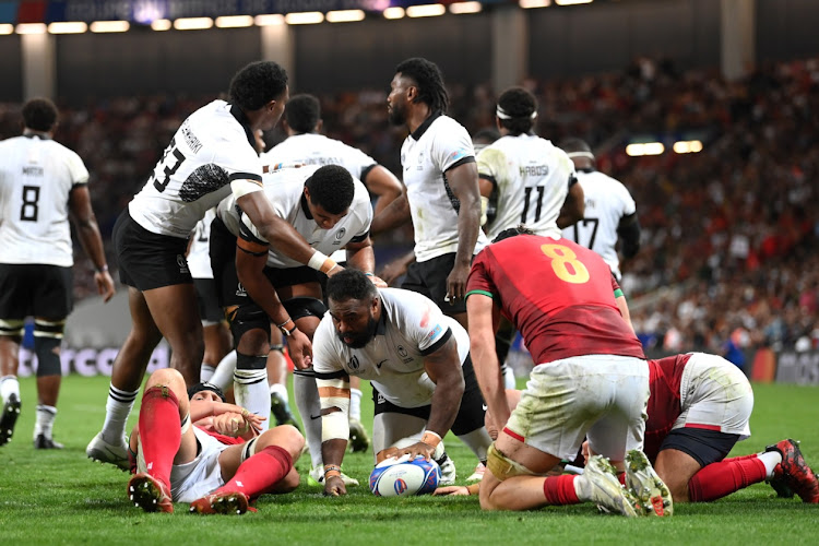 Mesake Doge scores Fiji's second try in their Rugby World Cup match against Portugal at Stadium de Toulouse on Sunday.