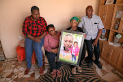 Mantombi, Dineo, Nomthandazo and Themba Rapodile are sad that the sentences of the killer of Nonhlanhla and Hlelokuhle Rapodile  (in picture)  will run concurrently.  /Thulani Mbele