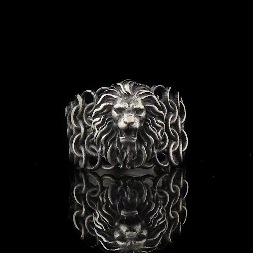 Title 3, Ornament Gold Lions Head Fashion Ring. A bold ...