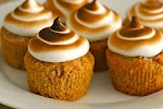 Sweet Potato Cupcakes with Toasted Marshmallow Frosting was pinched from <a href="http://www.annies-eats.com/2009/11/20/sweet-potato-cupcakes-with-toasted-marshmallow-frosting/" target="_blank">www.annies-eats.com.</a>