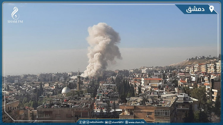 Smoke rises after an Israeli missile strike on Damascus, Syria, January 20 2024. Picture: SHAM FM/REUTERS