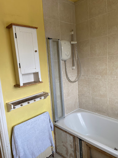Tiered bathroom before refurb