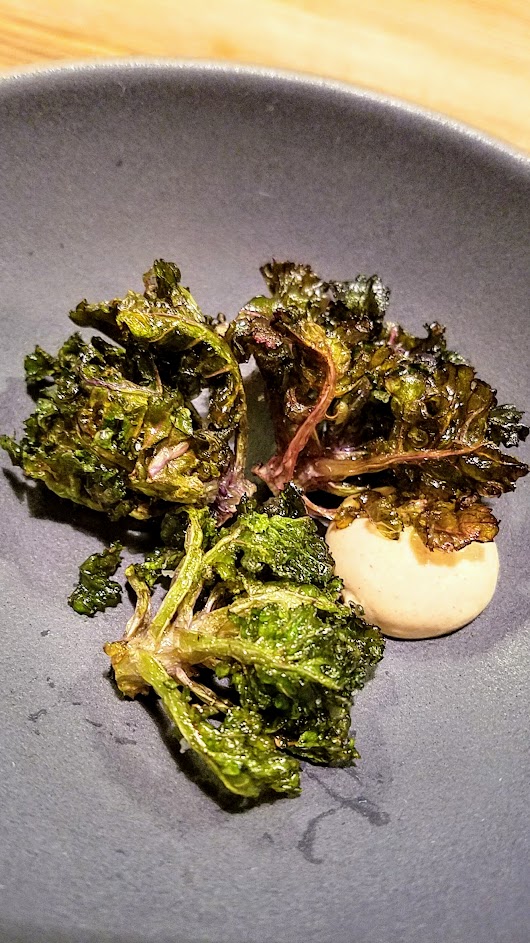 Farm Spirit 7:45 PM seating on December 16th dinner: This snack is a fried kalette with hazelnut yogurt with allium. A kalette is a cross between brussel sprouts and kale.