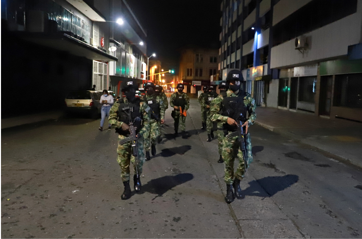 Members of security forces patrol in Cali as President Ivan Duque ordered "the maximum deployment" of military personnel to Cali and Valle del Cauca province following the violence in and around Colombia's third-largest city on Friday, as protests continue in Colombia on May 29, 2021.