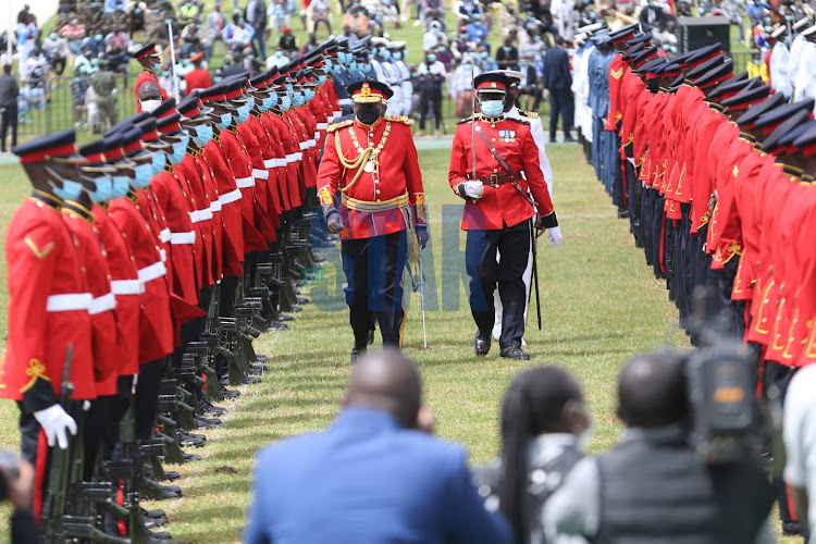 President Uhuru Kenyatta inspects a guard of honour during the 57th Jamhuri Day on December 12, 2021 at Uhuru Gardens