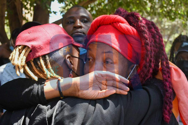 Marylize Boibwa breaks down during a peaceful demonstration with the queer community within Nairobi CBD on January 13, 2022.