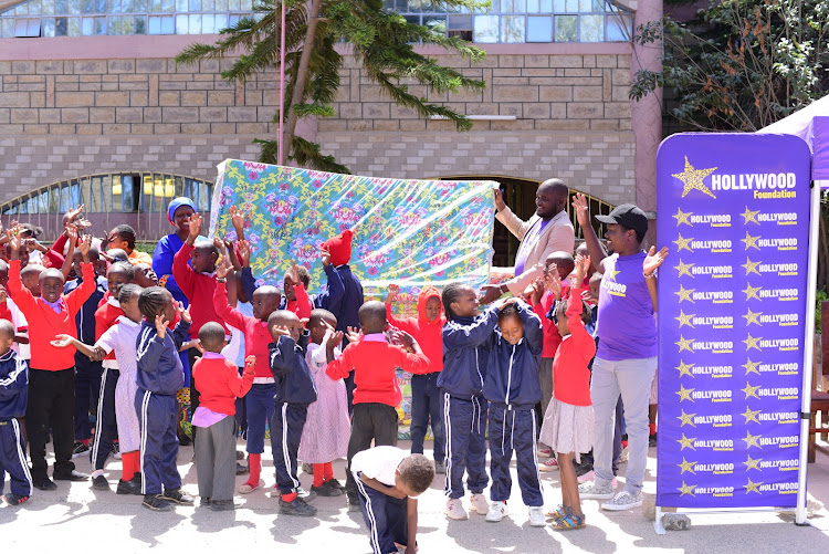 The Hollywood Foundation lead by regional manager Collins Opanga and Marketing Manager Clive Njeri donate mattresses to Heritage of Faith and Hope Children’s Home School. Present was the school founder Theresia Waweru