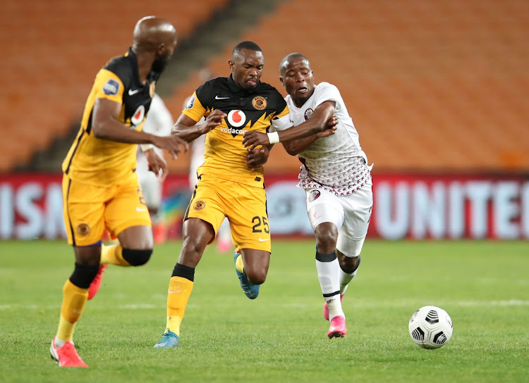 Bernard Parker of Kaizer Chiefs challenged by Thabo Matlaba of Swallows FC during the DStv Premiership 2020/21 match between Kaizer Chiefs and Swallows FC at FNB Stadium in Johannesburg on the 12 May 2021.