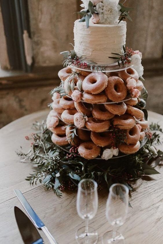 photo of wedding cake with donut tower