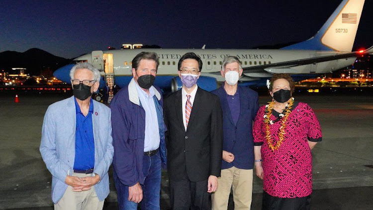 Taiwan's foreign ministry tweeted an image of members of the group being greeted at a Taipei airport