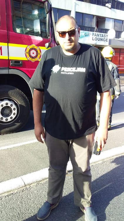 Faizel Petersen, chairman of the Goodwood Ratepayers' Association, at the scene of a fire on December 27 2018.