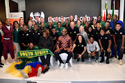 Sport minister Zizi Kodwa with the national women's netball and football teams at a breakfast event on Thursday.