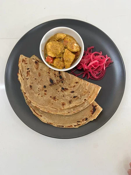 Kadai Chicken With Lachha Paratha And Onion Salad