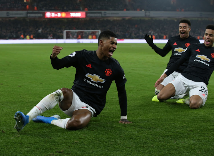 Marcus Rashford of Manchester United celebrates scoring their third goal during the English Premier League match against Sheffield United at Bramall Lane on November 24, 2019 in Sheffield, United Kingdom.